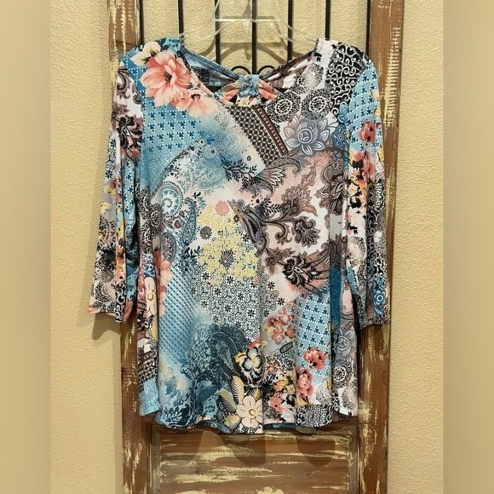 Boutique long sleeve blouse with butterfly cutout